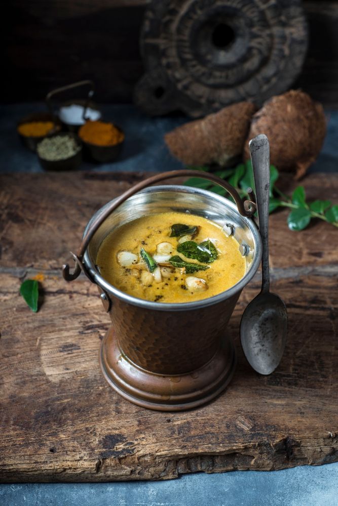 2 Curry served in a copper bucket